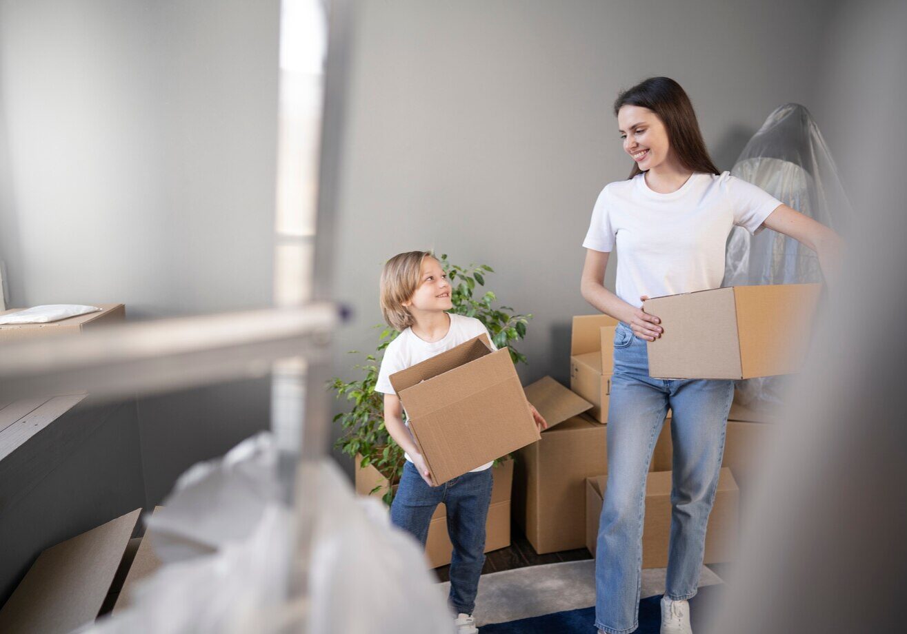 young-family-moving-into-new-home_23-2149196309